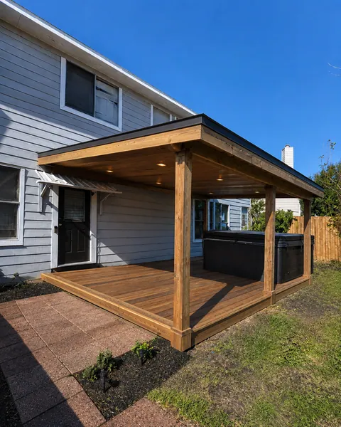 Completed pergola and outdoor space by Menjivar